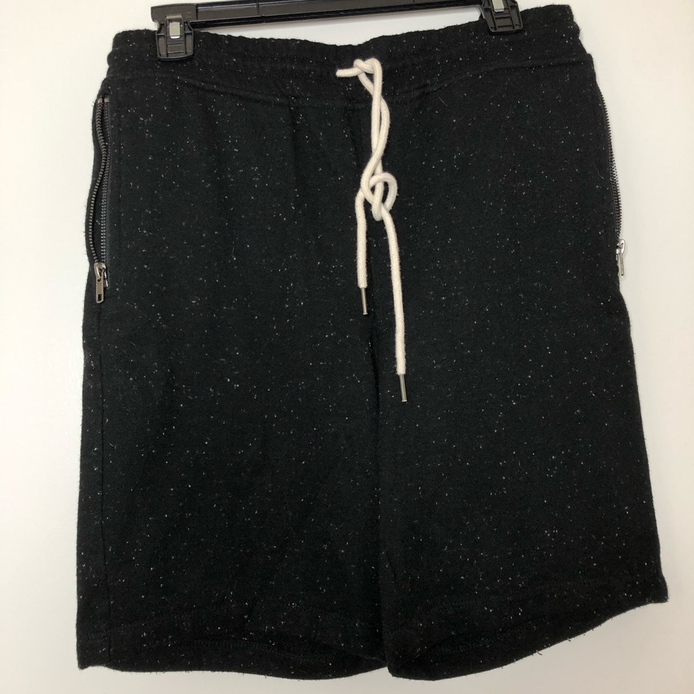 Black speckled fabric shorts with zippers